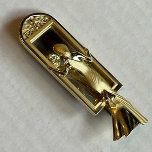 Women in Mirror gold tone brooch pin.